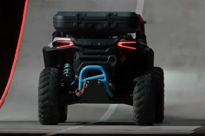 Off-road buggy climbing a ramp